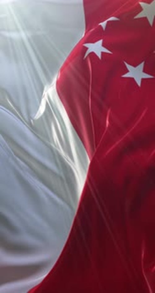 Singapore National Flag Waving in Bright Sunlight