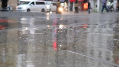 Water Drops on the Rainy Day Night View in the City Selective Focus
