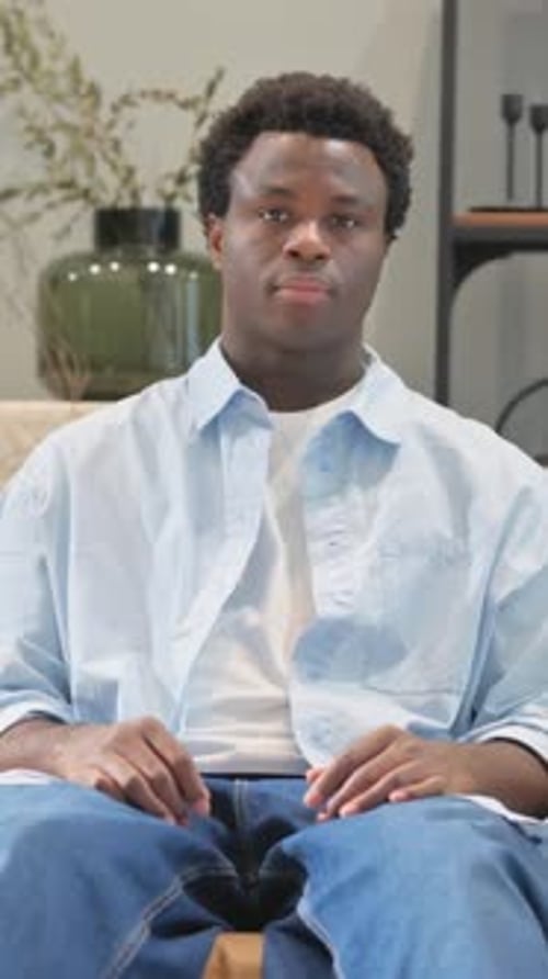 Young Adult Portrait Sitting Still Indoors