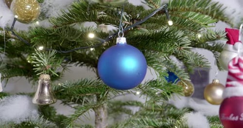 Christmas Tree Decorated with Colorful Baubles and Lights