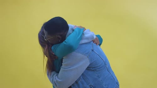 Smiling Couple Share a Heartfelt Embrace