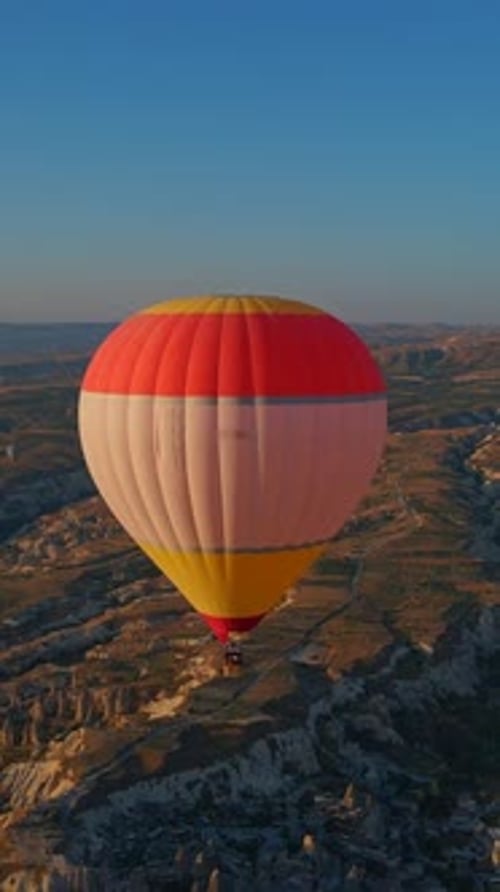 Vertical Video In This Aerial Video the Skies Above Cappadocia Turkey Come Alive with a Kaleidoscope