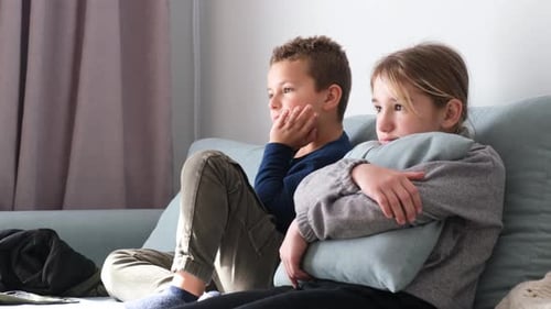 Kids Relaxing on the Couch at Home