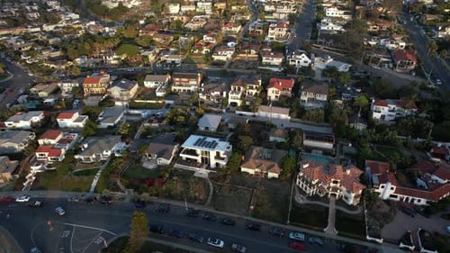 San Diego Cliffs, California, USA. Drone aerial view of upscale neighborhood on sunny evening, villa