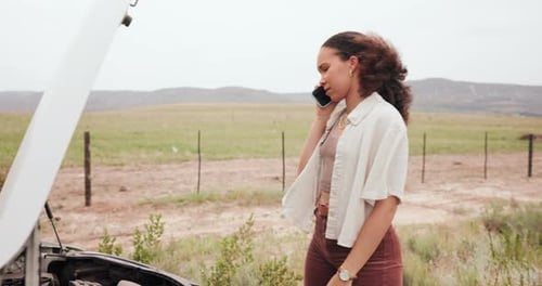Young Woman Calling For Help With Car Trouble