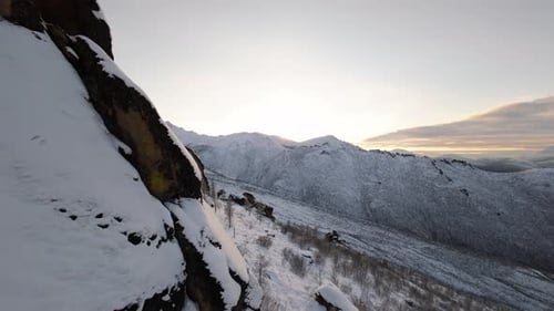 Snowy Mountains Landscape in Winter at Golden Hour