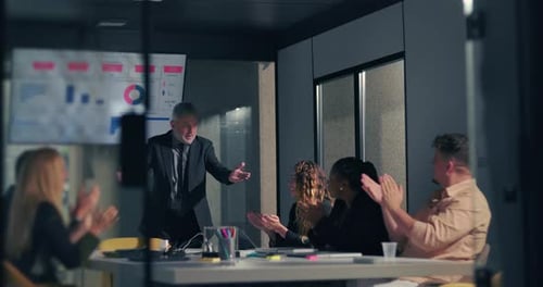 Business Meeting With Presentation and Teamwork