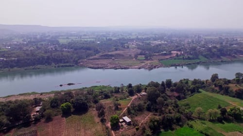 agricultural land with narmada river and trees at Jotpur, Jabalpur, madhya pradesh, india. day time,