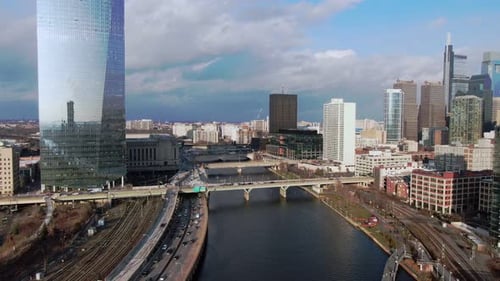 Revealing aerial shot of Philadelphia's skyline with modern skyscrapers of the financial district an