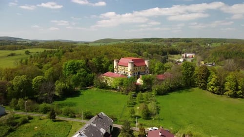 Aerial view of the female Castle. Czech castle on top of the hill. Divci Hrad, Czech Republic 4K