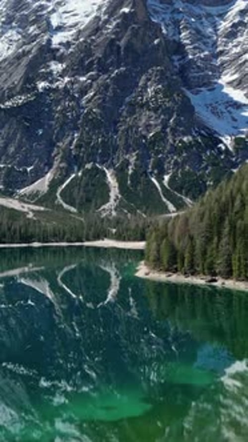 Aerial view of mountain Lake Braies in Dolomite Alps, South Tyrol, Italy, 4k