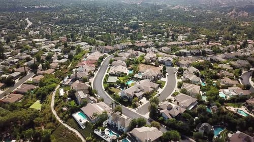Expensive real estate villas with pool and tennis field on top of Mountain. Sunny day in Hidden Hill