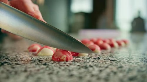 Cutting Gourmet Chocolate Candies in Kitchen Close Up
