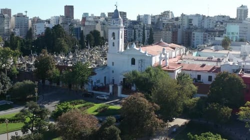 AERIAL - Recoleta Cemetery church, Buenos Aires, Argentina, wide forward rising