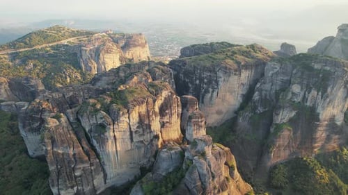 Meteora Rock Formations Greece. Aerial 4 K View Of Massive Cliffs And Natural Scenery. Unesco Greece