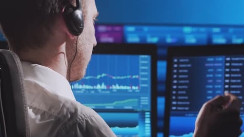 Trader Works in Office Using Workstation and Analysis Technology Workplace of Professional Crypto