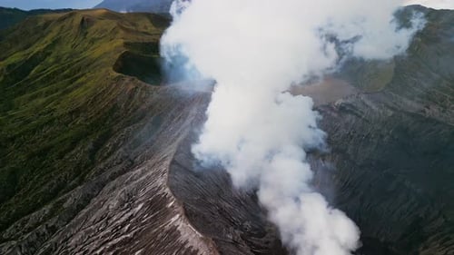 Drone View Over Mount Bromo Showing Active Volcanic Crater and Rugged Caldera Landscape