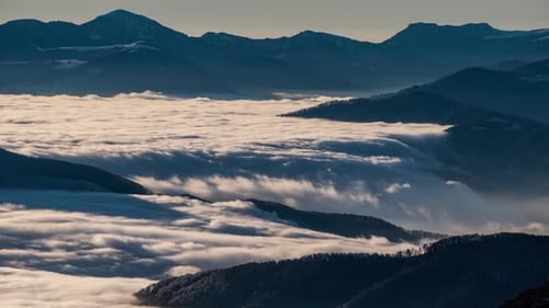 Foggy Clouds Motion Like River in Sunny Mountain Valley Nature