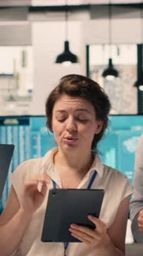 Vertical Video Portrait of Work Team Analyzing Data Analysis Results and KPI Metrics