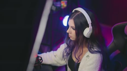 Young Adult Woman Gaming in Colorful Room