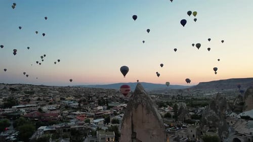 A balloons flies over Cappadocia, Turkey. Air balloons aerial view.