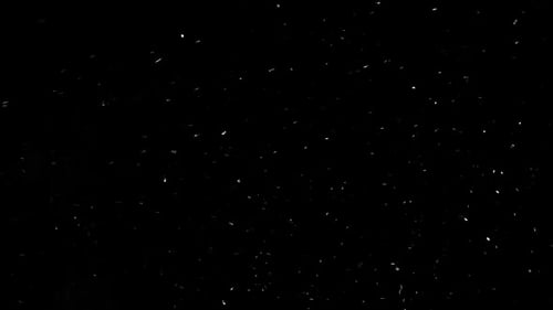 Drifting White Particles on Black Abstract Background