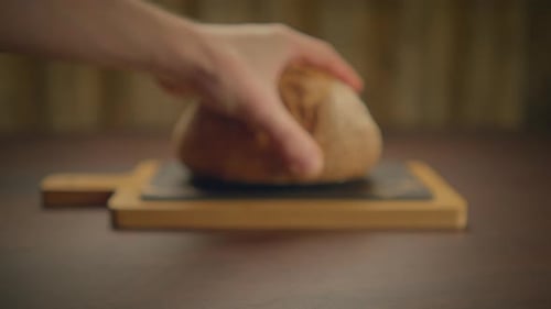 Rustic Bread on Cutting Board Still Shot