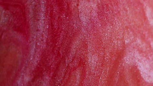 Macro Shot of Sparkling Pink and Red Paint