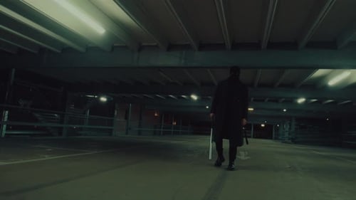 Masked Figure with Baseball Bat in Underground Garage