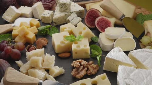 Various Cheeses and Food on Platter Close Up