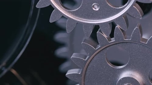 Interlocking Gears Turning in a Close Up Shot