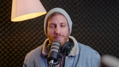 Adult Man Recording Audio in Studio