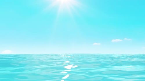 Sunlit Ocean with Clear Blue Sky