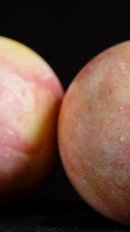 Close-up Shot of Painted Eggs on Dark Background