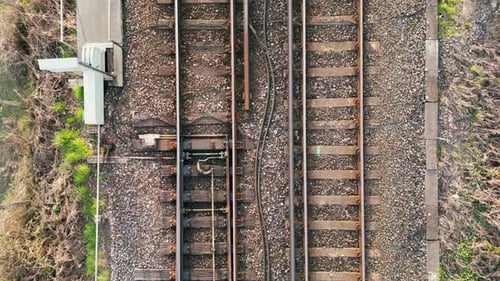 Overhead shot of railway lines slowly revealing longer part of track