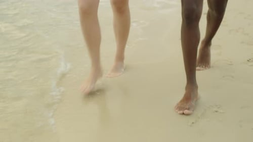Couple Walking Together on the Beach in Australia. Red