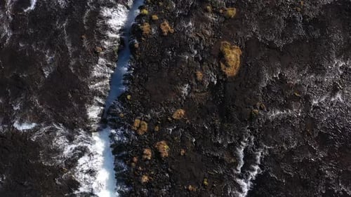 Drone Flight Over The Flowing Waters Of A Blue River