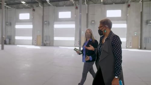 Architects Discussing Warehouse Expansion Plan