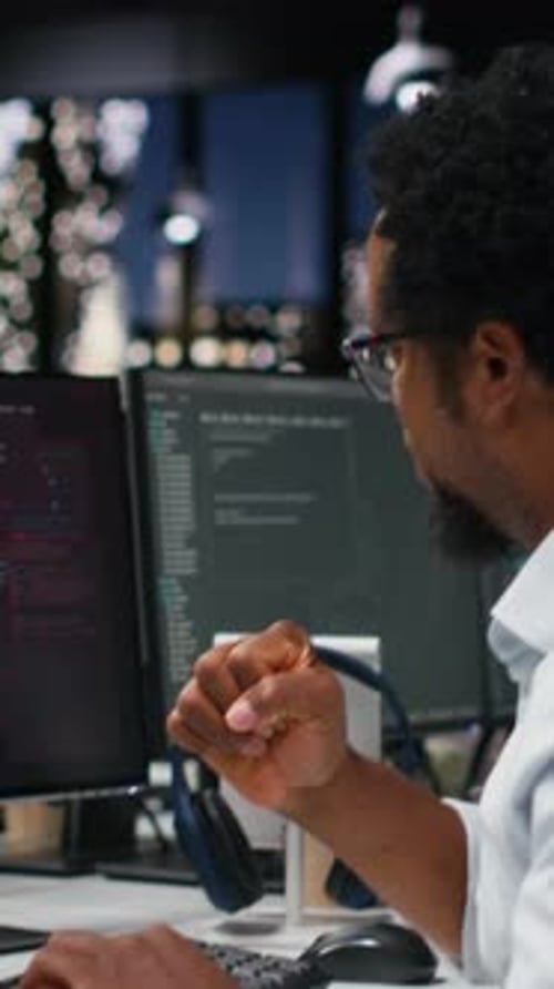 Vertical Video Panicked Admin at Office Desk Thinking How to Fix Critical Error Alert