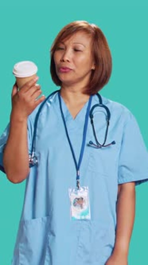 Nurse Enjoying Cup of Coffee