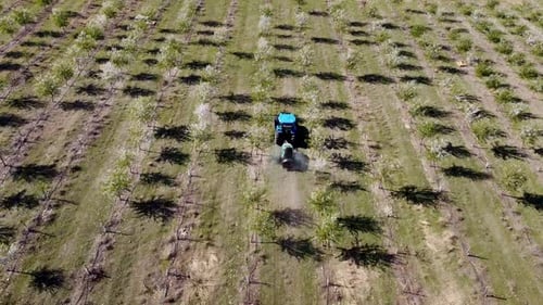 Tractor cultivating process aerial view
