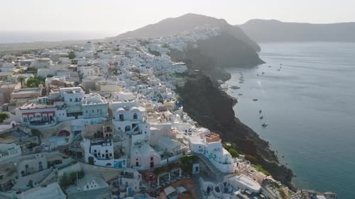 Aerial shot of Oia village and Santorini caldera, Greece