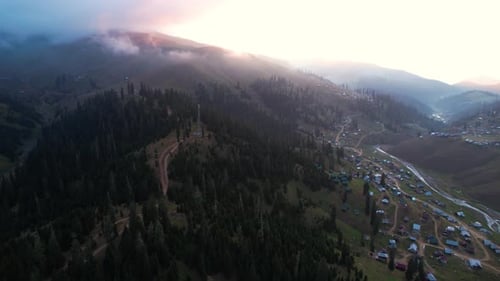 Foggy sunset in the mountain village