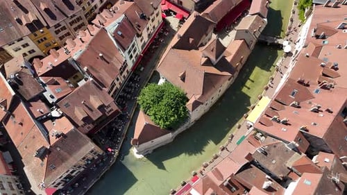 Aerial view of Palais de l'Ile, a medieval landmark in Annecy, France