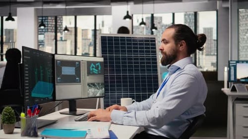 Portrait of Happy Sustainable Energy Researcher Using Simulation Software