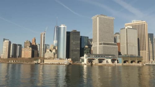New York City Manhattan City Skyline with birds flying through moving video shot in 4k
