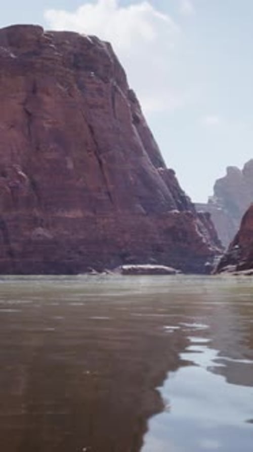 A Serene Lake Nestled Among Majestic Mountains and Rocky Terrain