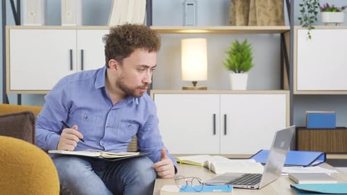Young Adult Working from Home on Video Call