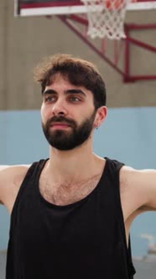Man with Beard on Basketball Court
