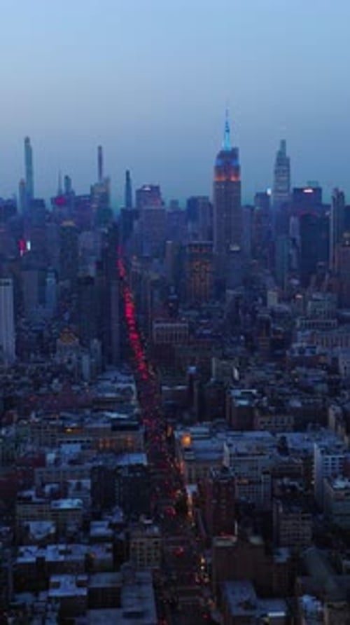 Impressive New York panorama after the sunset. Hundreds of cars with red lights